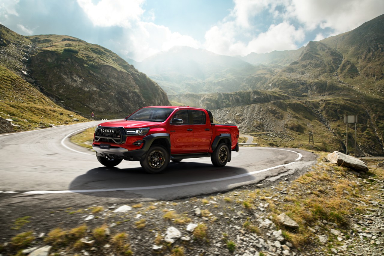 Toyota Hilux driving up a mountain